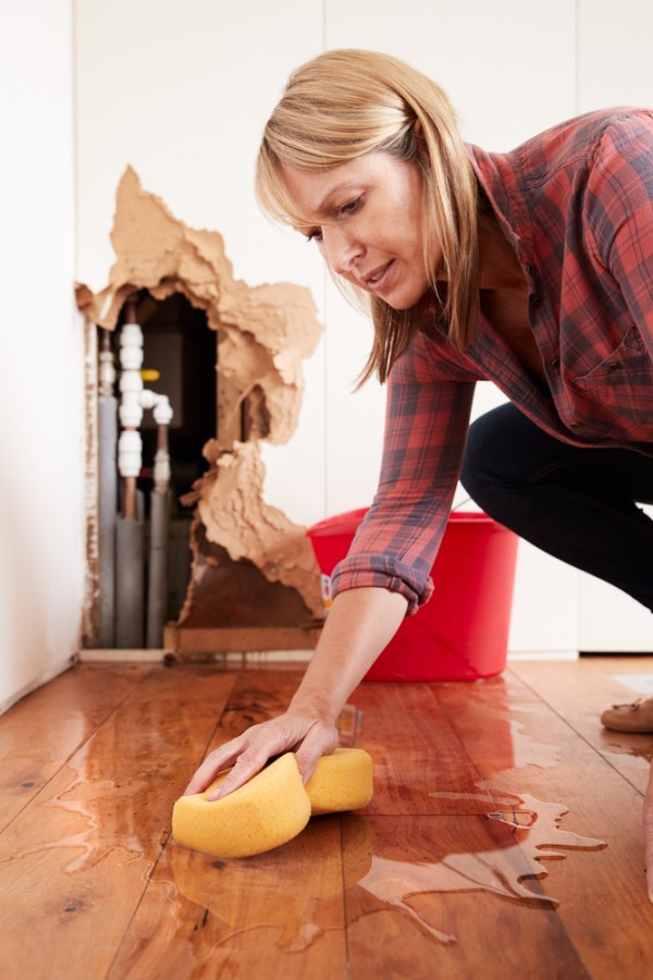 Woman Mopping Water